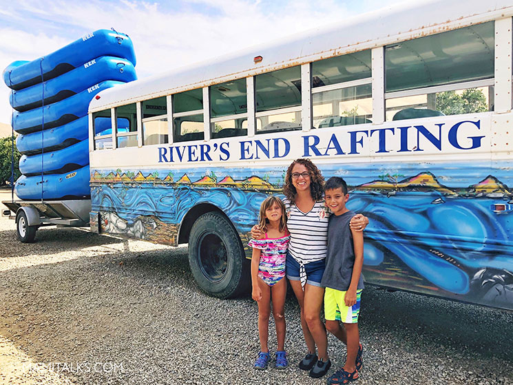Mom and kids standing in front of River's End Rafting bus. -mamitalks.com