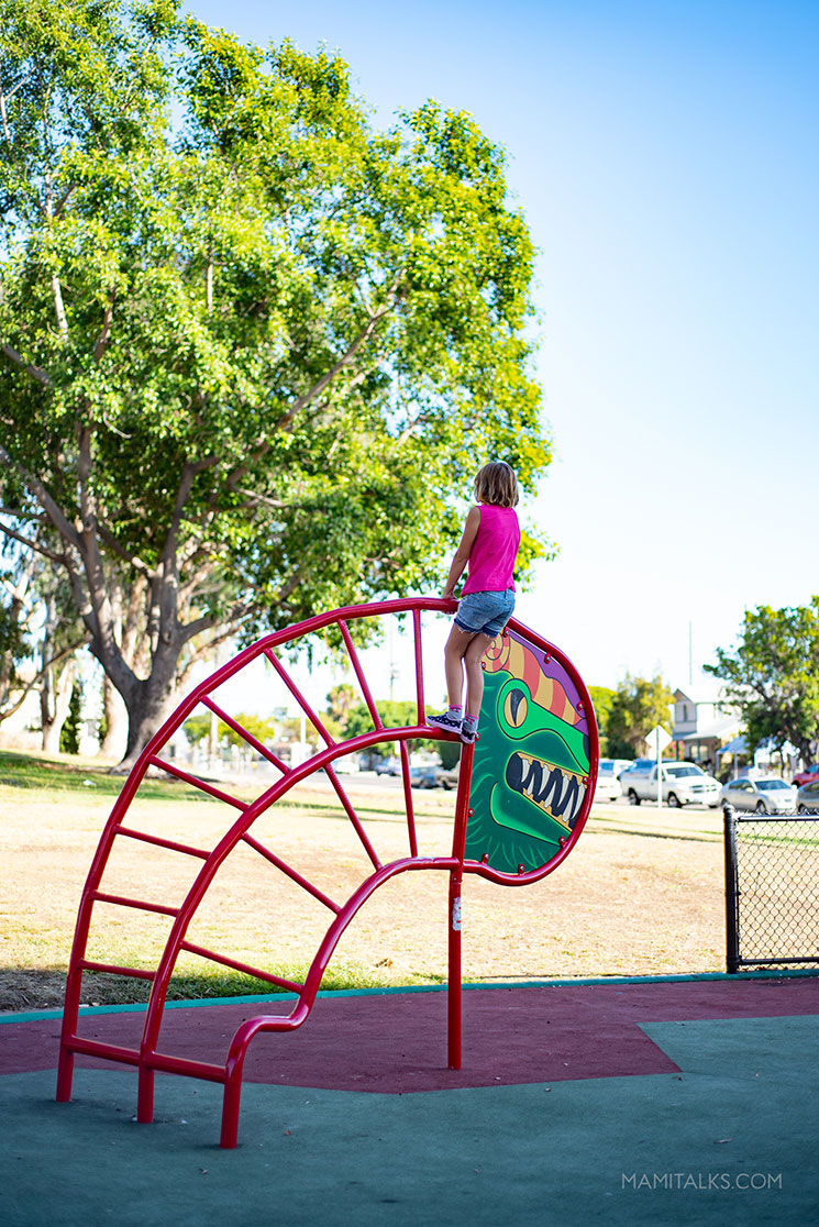 Girl playin in playground chicano park, san Diego. -MamiTalks.com