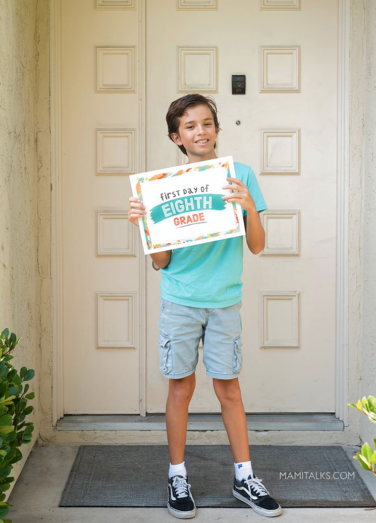 Boy showing sign of first day of school. -MamiTalks.com